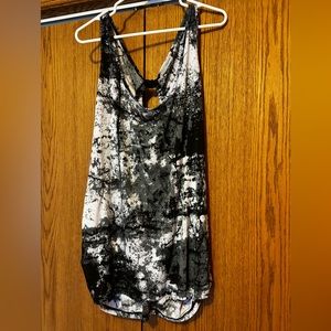 Maurices brand women’s tank size XXL. Rhinestone embellishments, tapered sides